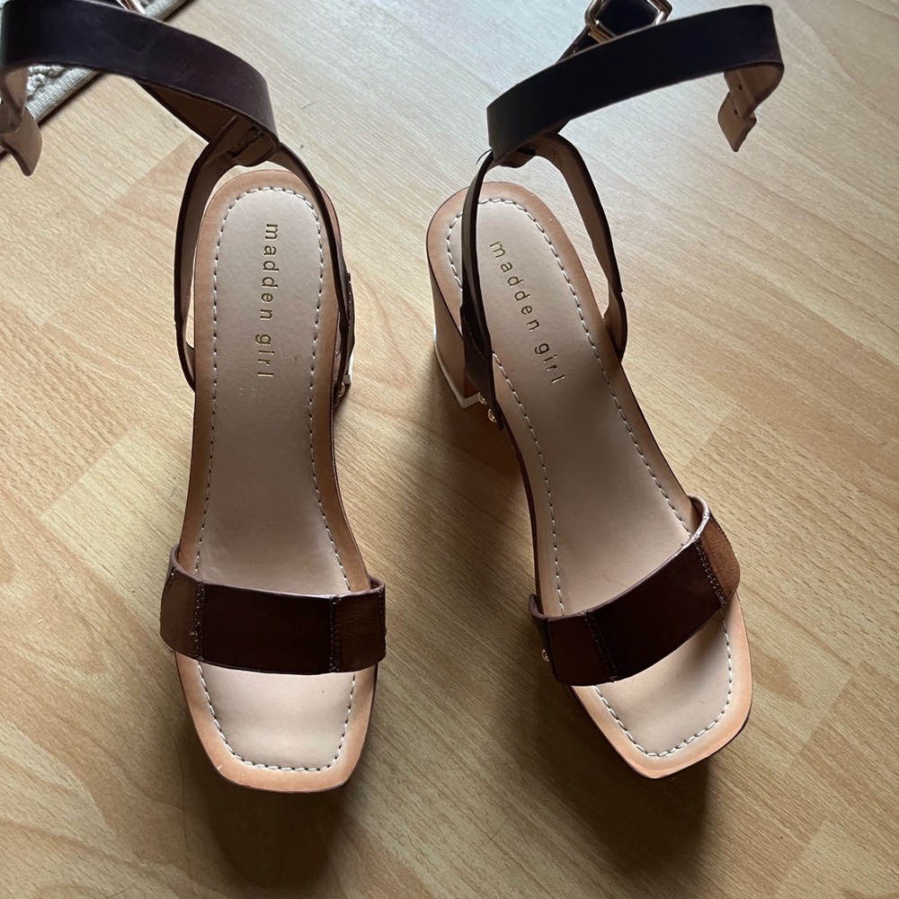 Heeled sandals with ankle strap.